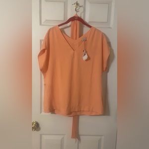 NWT light orange Naked Zebra top